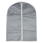 Hanging garment covers protecting clothes inside a closet