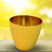 Plastic Flower Valencia Pot placed in a vibrant garden setting