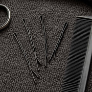 Set of 24 large black hair bobby pins ideal for hairstyling and sectioning