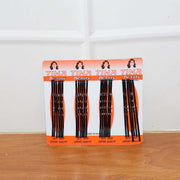 Lifestyle image of black hair bobby pins used in an elegant bun hairstyle