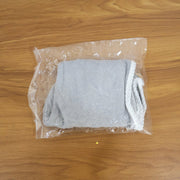 Woman comfortably wearing the turban towel for women while relaxing.