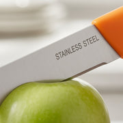 Ergonomic anti-slip handle on kitchen paring knife for comfortable grip