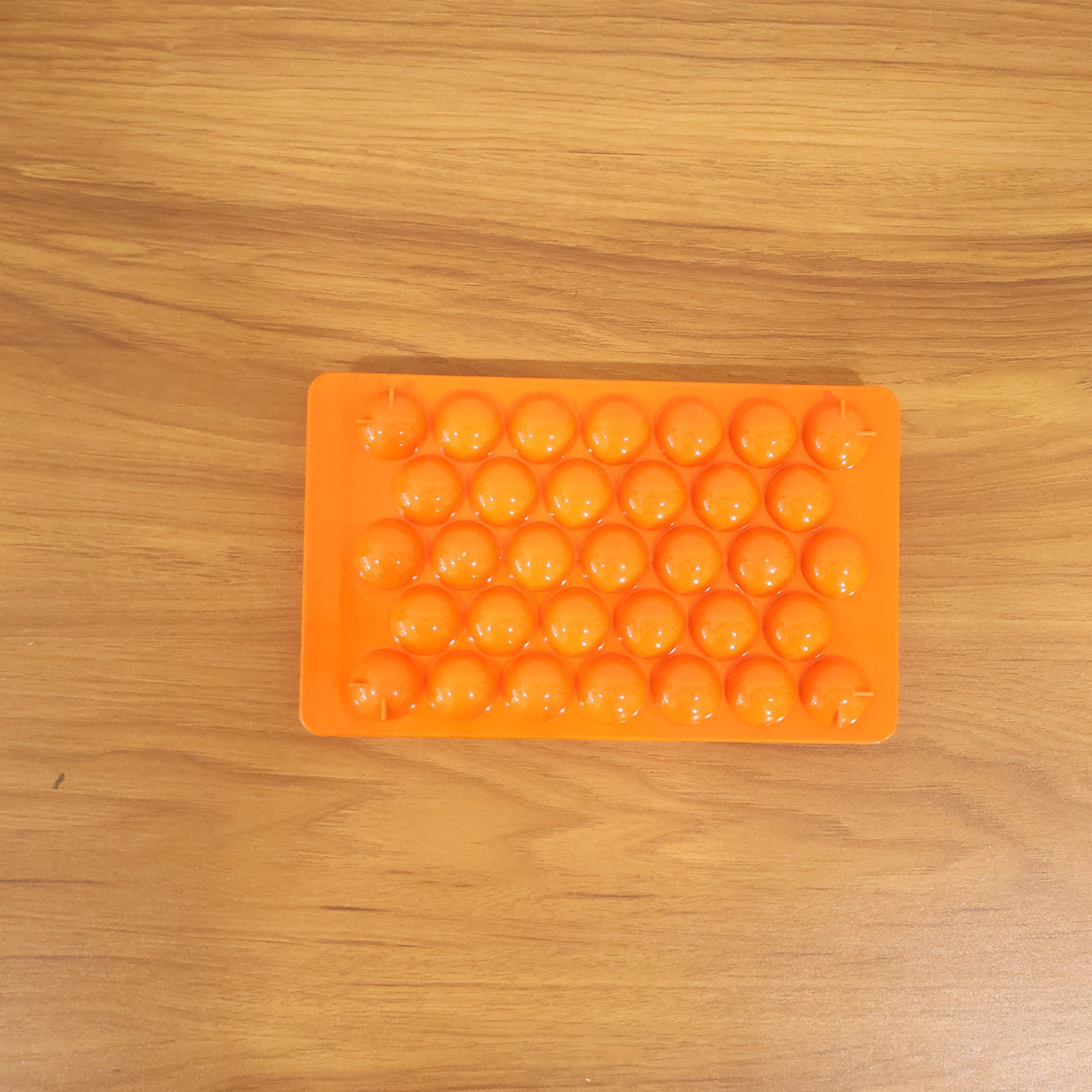 Kitchen candy making mold in orange