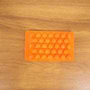 Kitchen candy making mold in orange