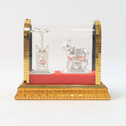 Silver-plated decorative Kamdhenu cow pooja idol in acrylic frame
