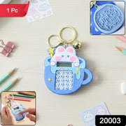 Close-up view of mini digital calculator on bunny keychain