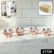 Mop holder clip mounted on white wall holding mop securely